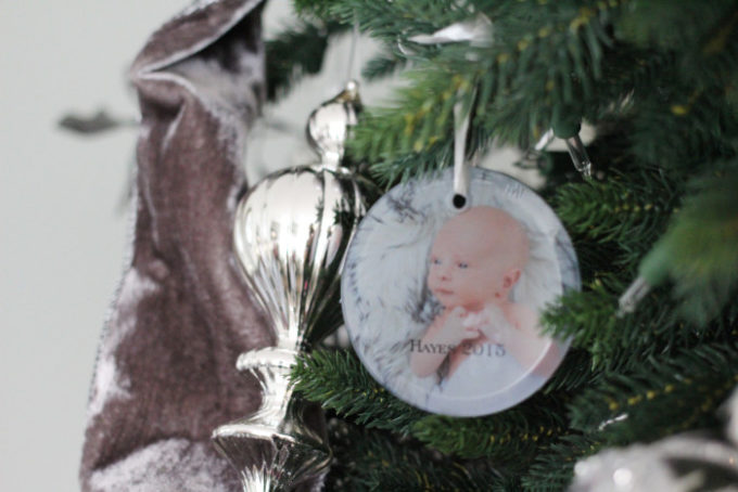 A glass photo ornament from Shutterfly with a baby photo.