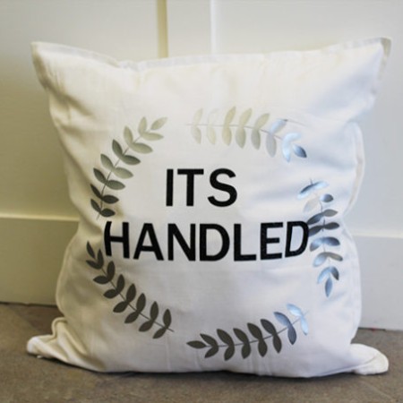 throw pillow with "its handled" a quote from scandal tv show
