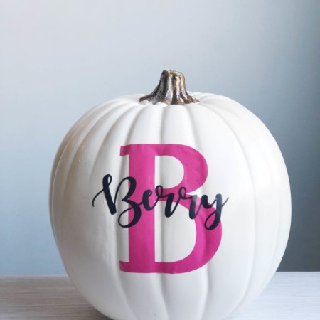 Tricks to making your own vinyl monogram pumpkin - Applying vinyl to a curved surface.