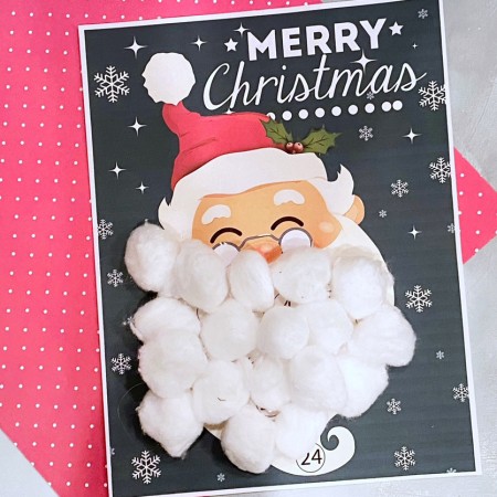 paper with cottom balls on santas beard as a countdown to Christmas
