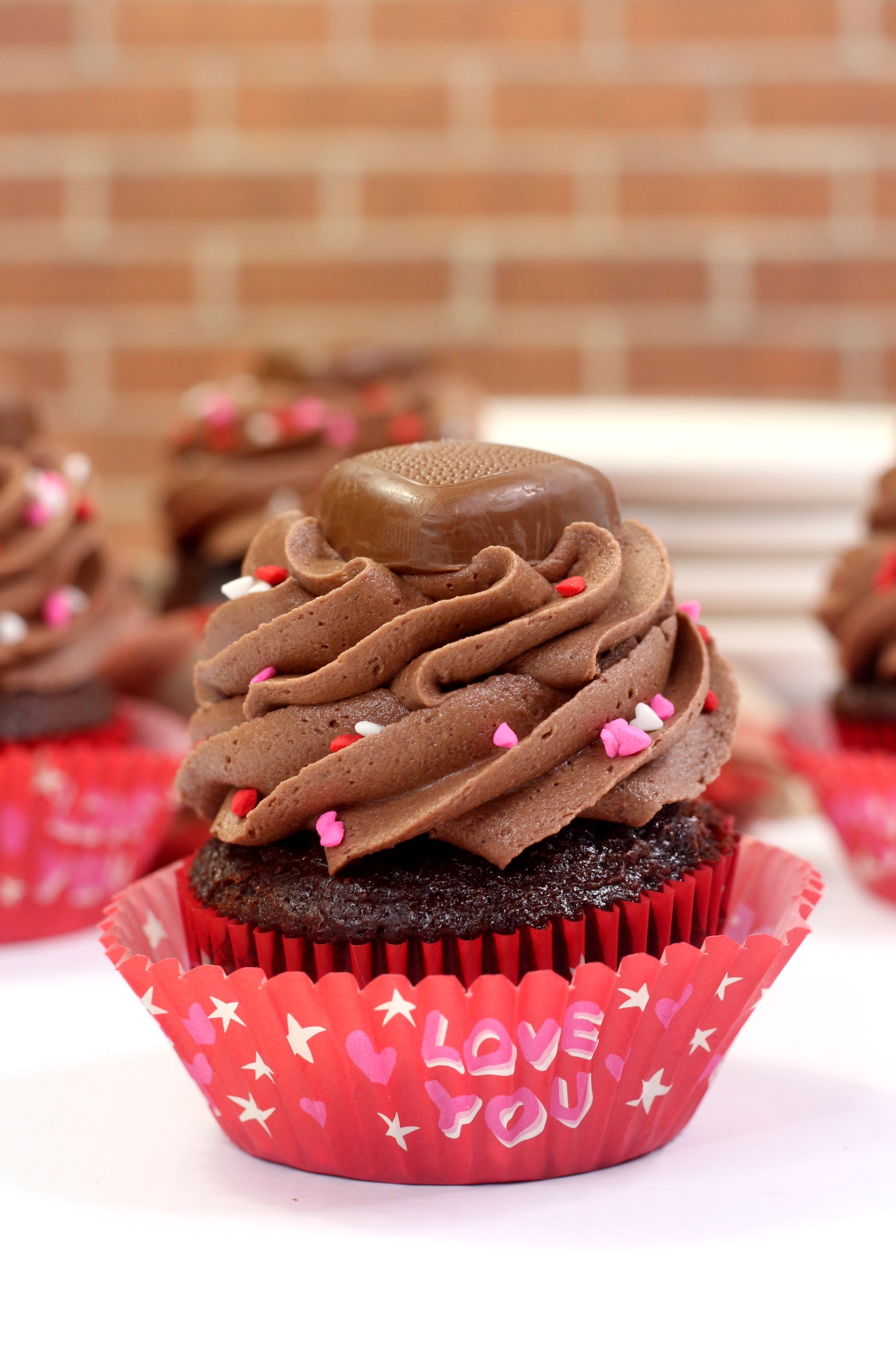 Pretty chocolate cupcake with heart sprinkles for Valentines Day.
