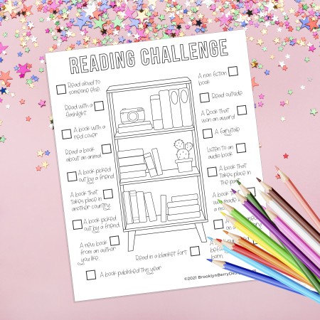 paper and colored pencils with kids reading challenge