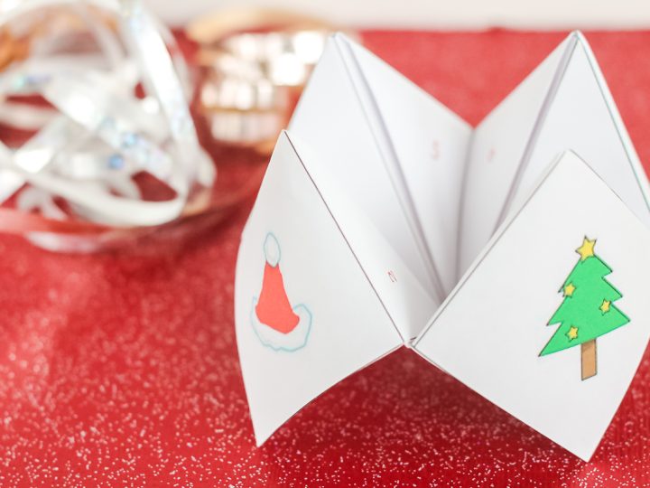 an origami cootie catcher with christmas designs