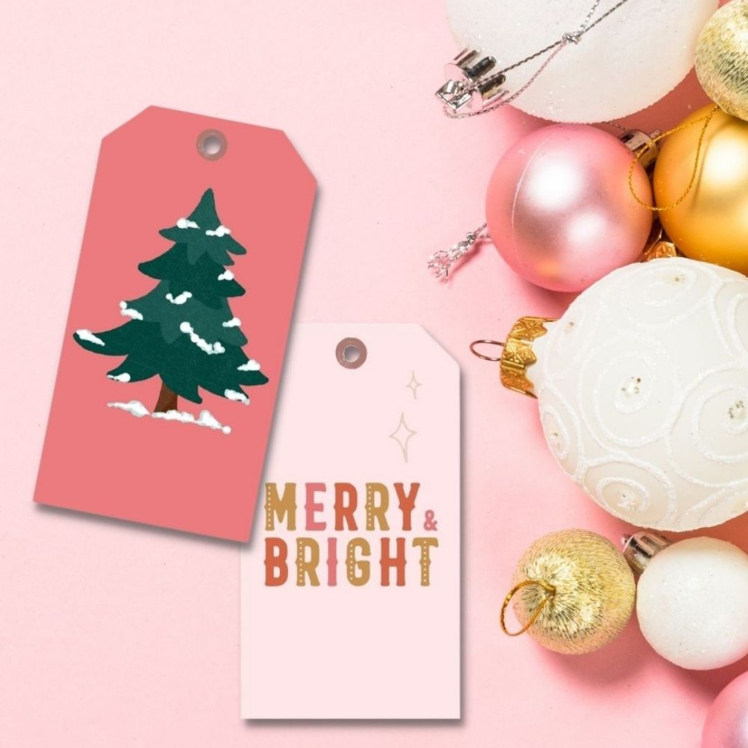 pink christmas gift tags with pink white and gold ornaments beside them