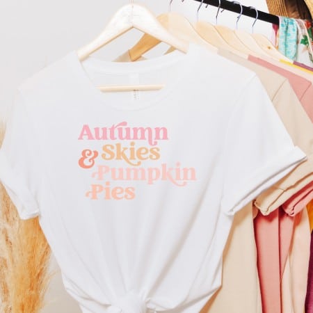 white shirt with autumn skies and pumpkin pies design