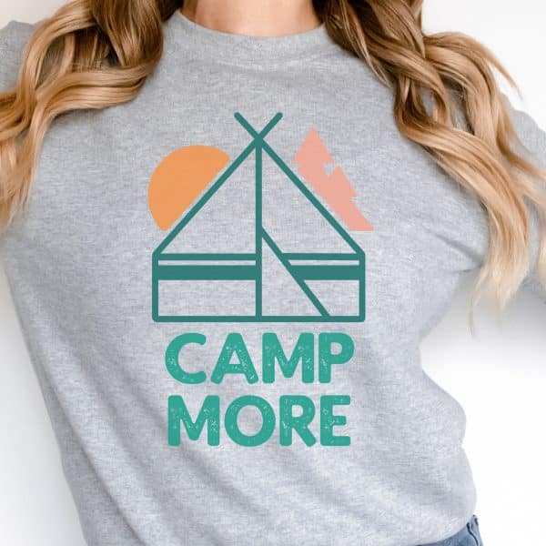 grey sweater with camp more text and tent design