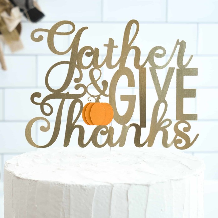 cake topper that says gather and give thanks.