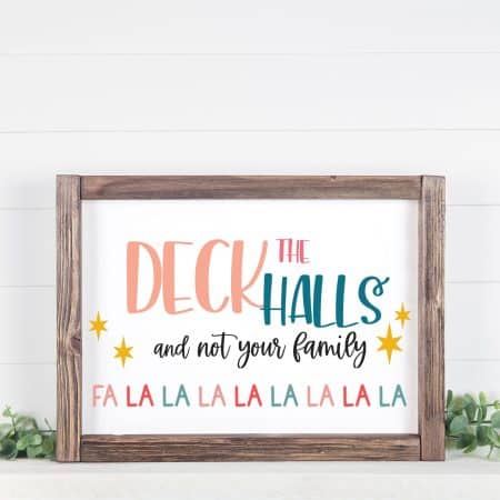 funny christmas sign saying Deck The Halls And Not Your Family