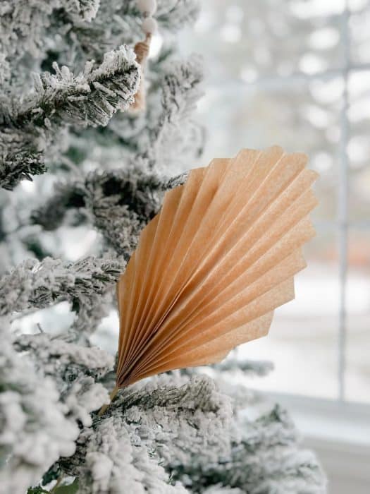 paper palm in a christmas tree for boho style holiday decor