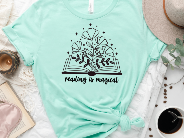 Reading is magic svg file on a teal shirt