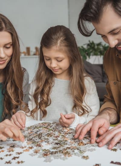 Family working on a puzzle together